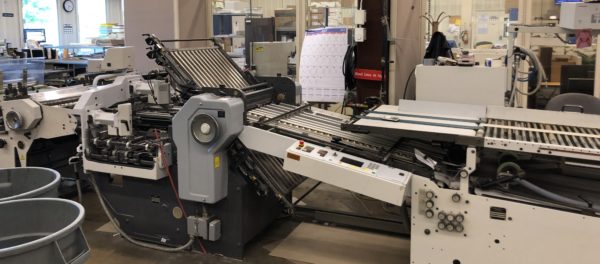 A printer's sorting and folding machine.